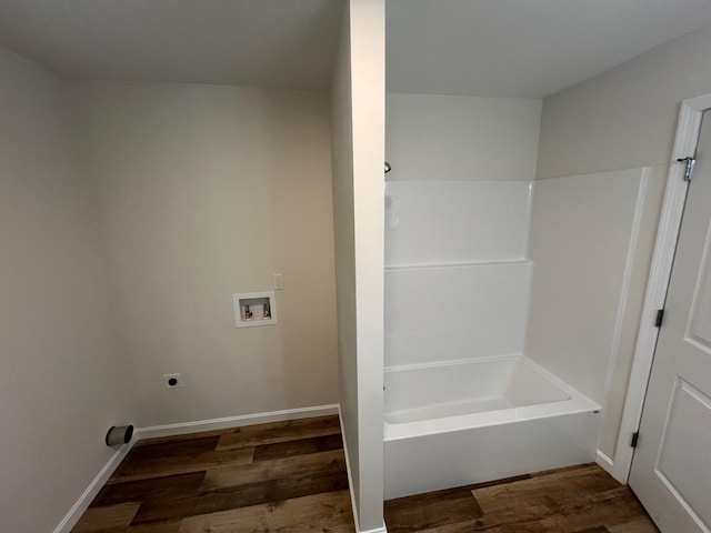 128 Main Street Hl, Dexter, ME 04930 - full bathroom with wood finished floors, shower / washtub combination, and baseboards