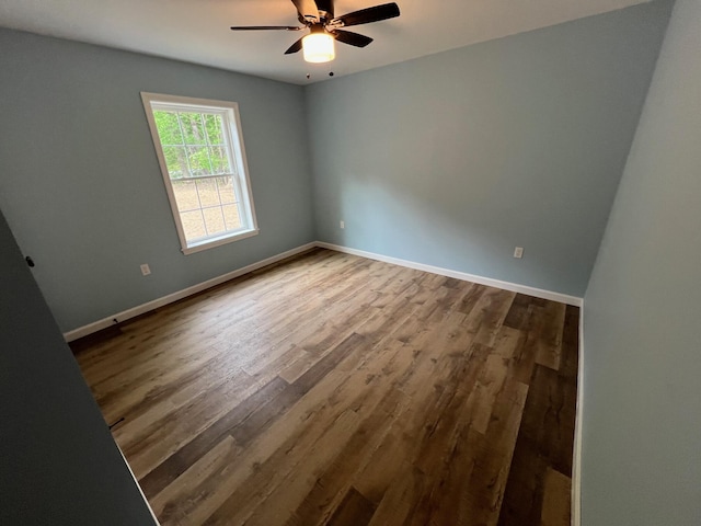 128 Main Street Hl, Dexter, ME 04930 - spare room featuring wood finished floors, ceiling fan, and baseboards