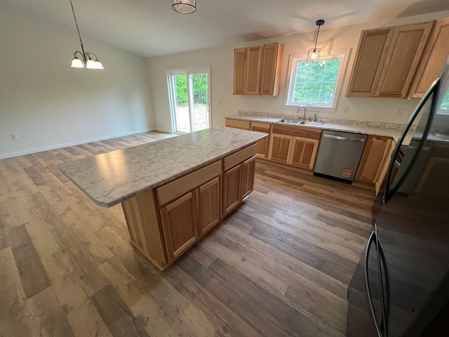 128 Main Street Hl, Dexter, ME 04930 - kitchen with dishwasher, a sink, plenty of natural light, and freestanding refrigerator