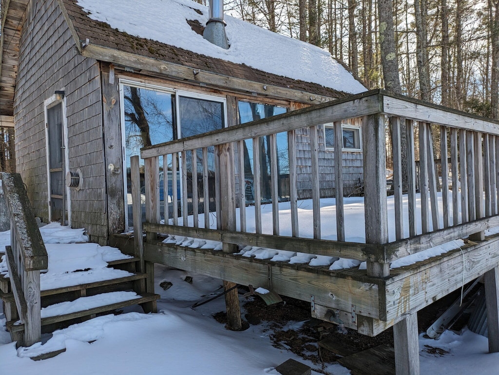 view of snow covered deck