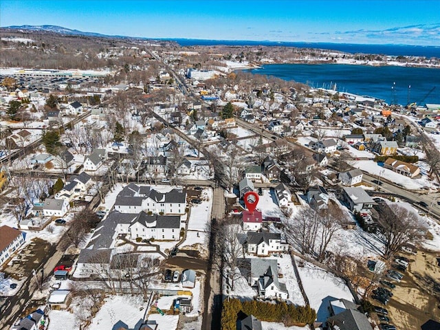 birds eye view of property featuring a residential view and a water view