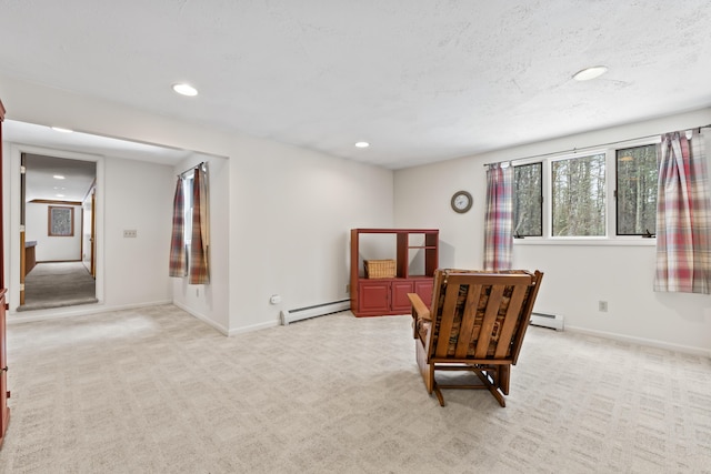 living area with recessed lighting, a baseboard radiator, and light colored carpet