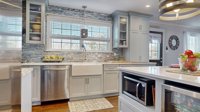 7 Dogleg Dr, Windham, ME 04062 - kitchen with stainless steel appliances, gray cabinetry, wine cooler, a sink, and light countertops