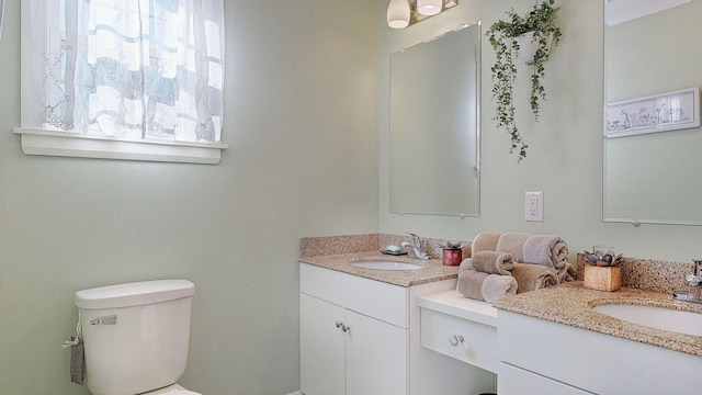 7 Dogleg Dr, Windham, ME 04062 - bathroom with double vanity and toilet