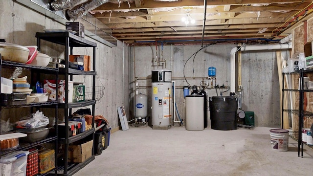 7 Dogleg Dr, Windham, ME 04062 - unfinished basement with water heater, a water pressure tank, and a water softener system