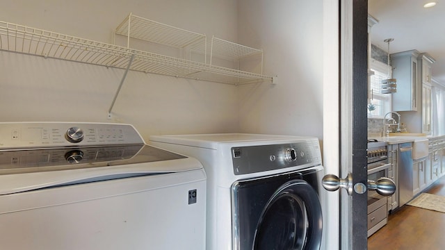 7 Dogleg Dr, Windham, ME 04062 - laundry room with washing machine and clothes dryer and dark wood-type flooring