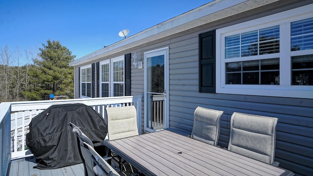 7 Dogleg Dr, Windham, ME 04062 - wooden terrace with outdoor dining space