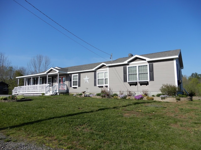 7 Dogleg Dr, Windham, ME 04062 - view of front of house featuring covered porch and a front lawn