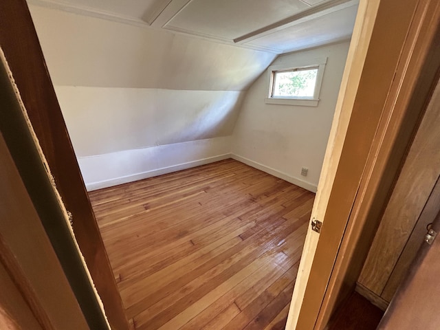 35 Bath Rd, Brunswick, ME 04011 - additional living space with baseboards, wood-type flooring, and lofted ceiling