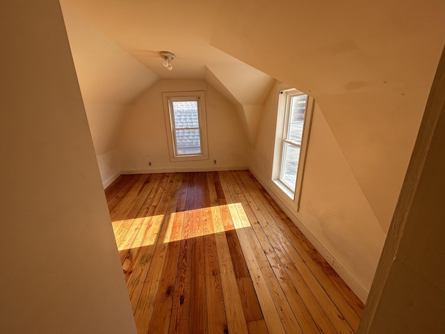 35 Bath Rd, Brunswick, ME 04011 - bonus room with wood-type flooring, lofted ceiling, and baseboards