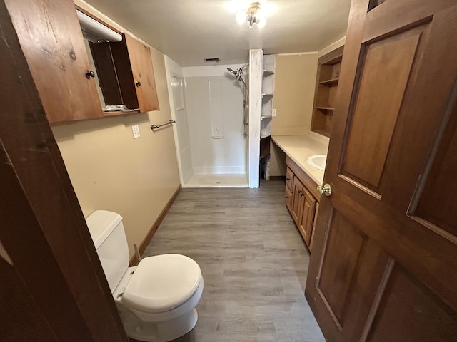 35 Bath Rd, Brunswick, ME 04011 - full bath with visible vents, walk in shower, toilet, wood finished floors, and vanity