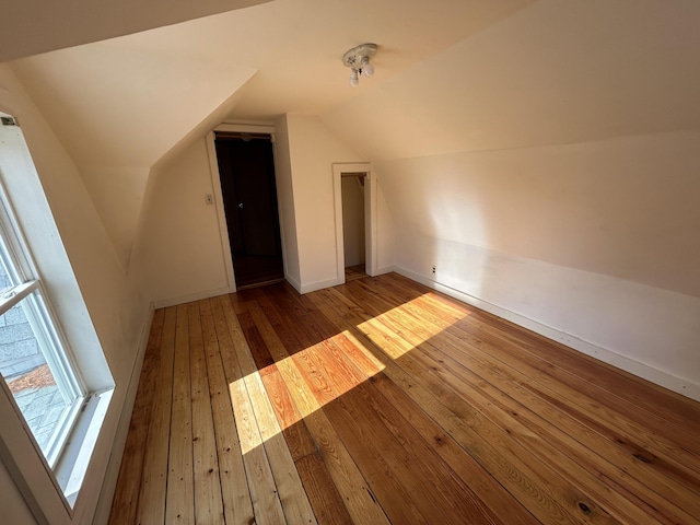 35 Bath Rd, Brunswick, ME 04011 - additional living space with lofted ceiling, hardwood / wood-style floors, and baseboards