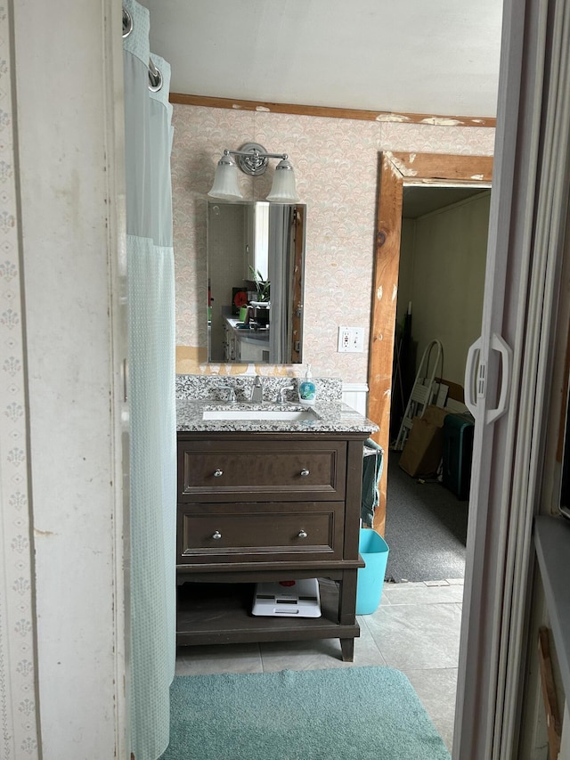 bathroom with vanity and tile patterned flooring