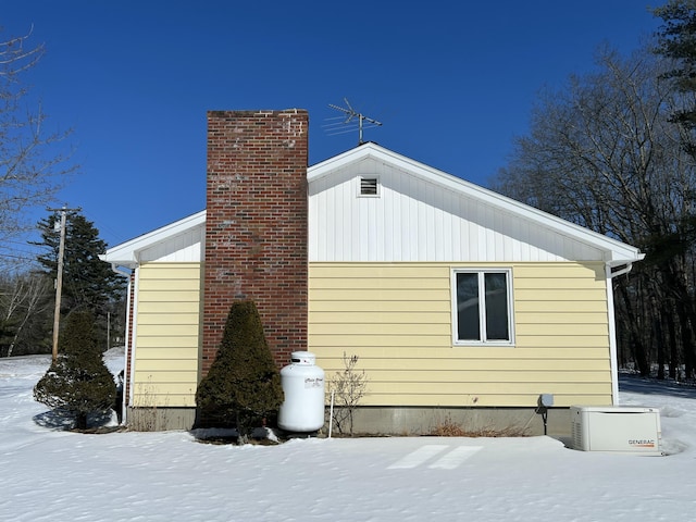 view of snow covered property