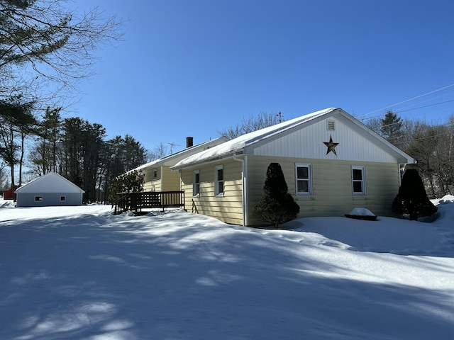 view of snow covered property