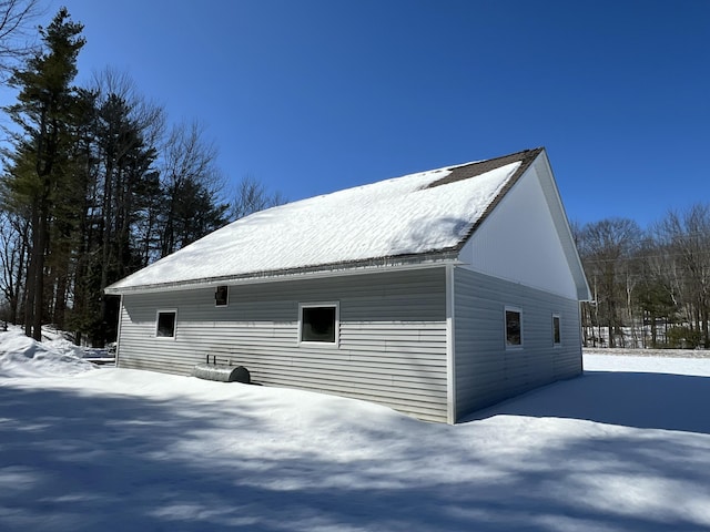 view of snow covered property