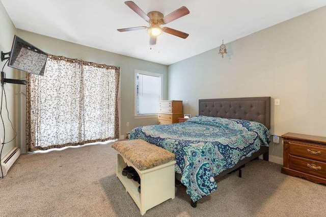 bedroom featuring carpet floors, a baseboard radiator, and a ceiling fan