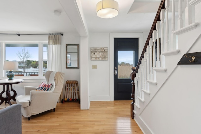 49 Langsford Rd, Kennebunkport, ME 04046 - entrance foyer with stairway and light wood finished floors
