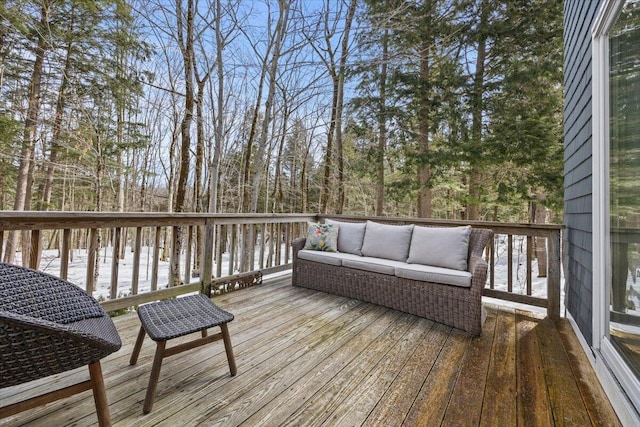 wooden deck featuring outdoor lounge area