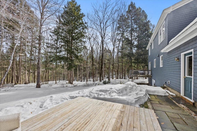 view of snow covered deck