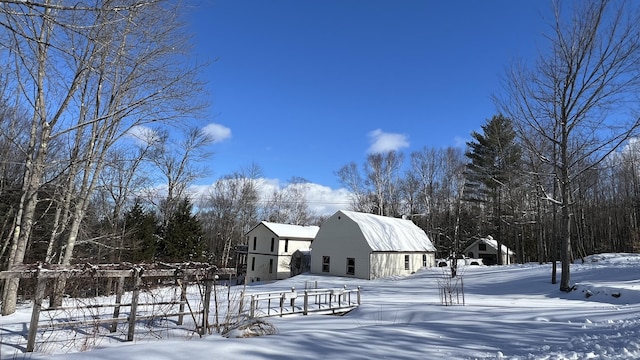 exterior space with an outdoor structure and a barn