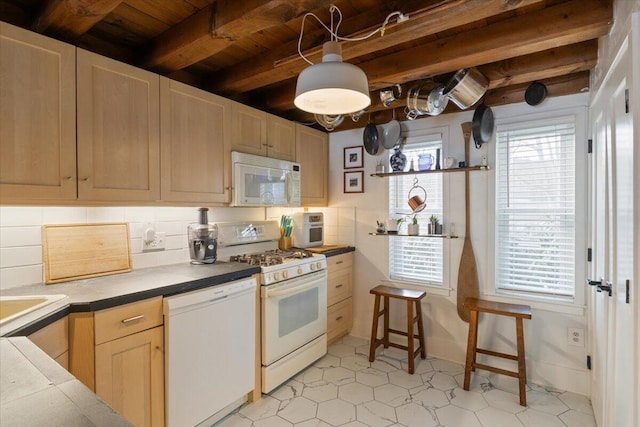 kitchen with beamed ceiling, light brown cabinetry, tasteful backsplash, white appliances, and baseboards