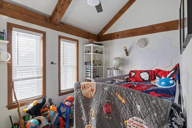 bedroom featuring lofted ceiling with beams and a ceiling fan