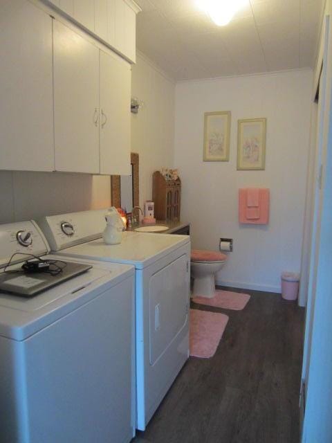 131 Clover St, Madawaska, ME 04756 - washroom with laundry area, a sink, baseboards, independent washer and dryer, and dark wood finished floors