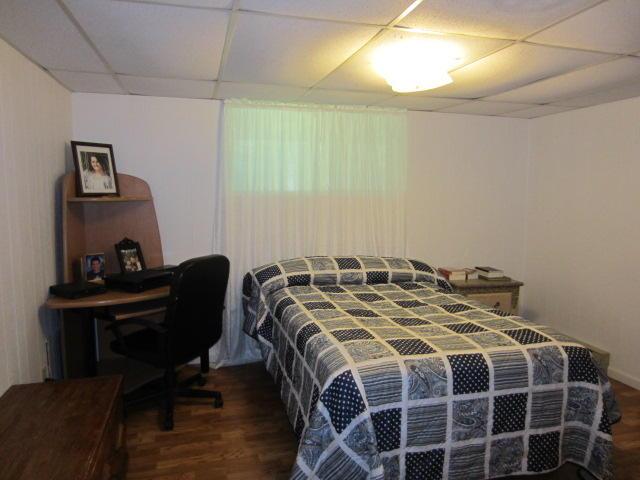 131 Clover St, Madawaska, ME 04756 - bedroom with a drop ceiling and wood finished floors