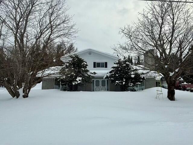 131 Clover St, Madawaska, ME 04756 - view of front of home with a garage
