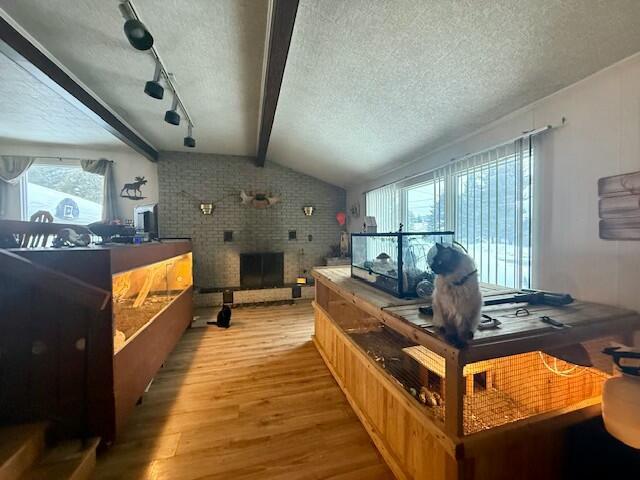 131 Clover St, Madawaska, ME 04756 - interior space featuring a brick fireplace