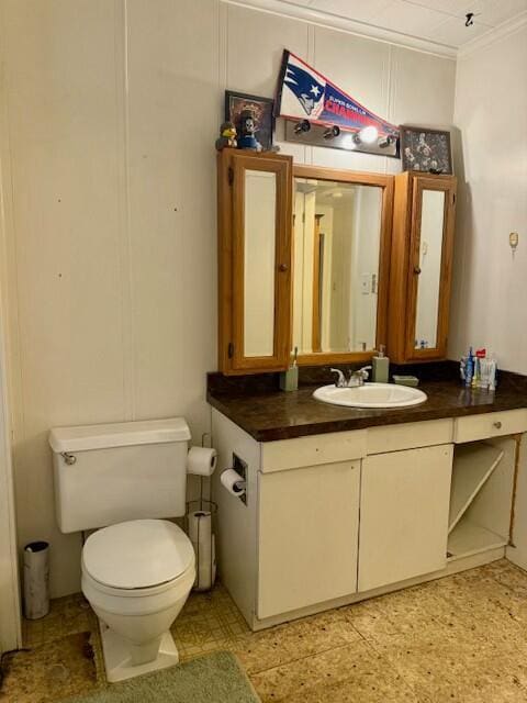 131 Clover St, Madawaska, ME 04756 - half bath featuring toilet, tile patterned floors, vanity, and crown molding