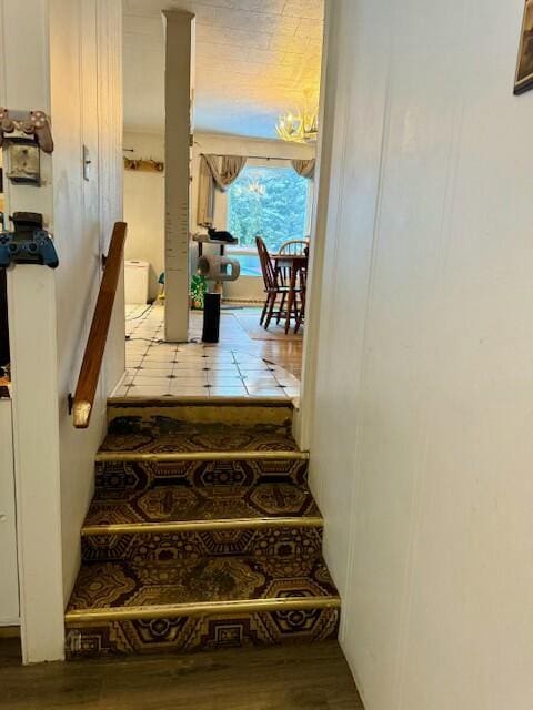 131 Clover St, Madawaska, ME 04756 - staircase featuring wood finished floors