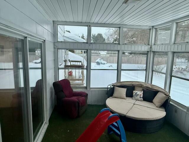 131 Clover St, Madawaska, ME 04756 - sunroom featuring wood ceiling and a wealth of natural light