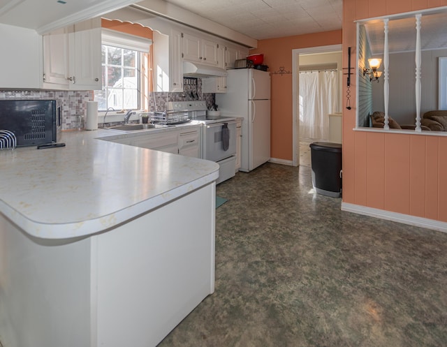 633 Main St, Madawaska, ME 04756 - kitchen with backsplash, white appliances, under cabinet range hood, and a sink