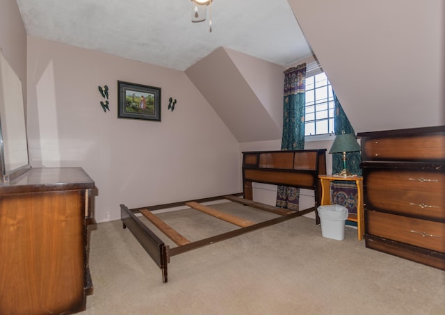 633 Main St, Madawaska, ME 04756 - carpeted bedroom with lofted ceiling