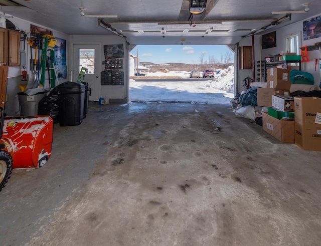 633 Main St, Madawaska, ME 04756 - garage featuring a garage door opener