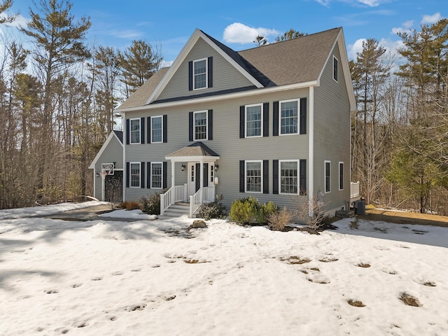 view of front of house featuring central AC