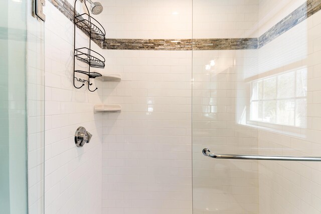 full bathroom with a stall shower