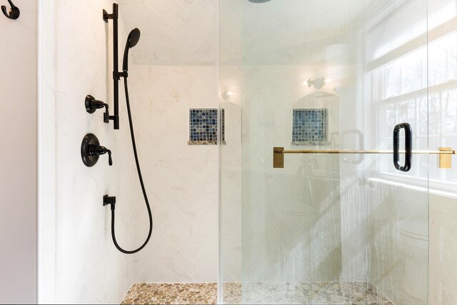 bathroom with a stall shower