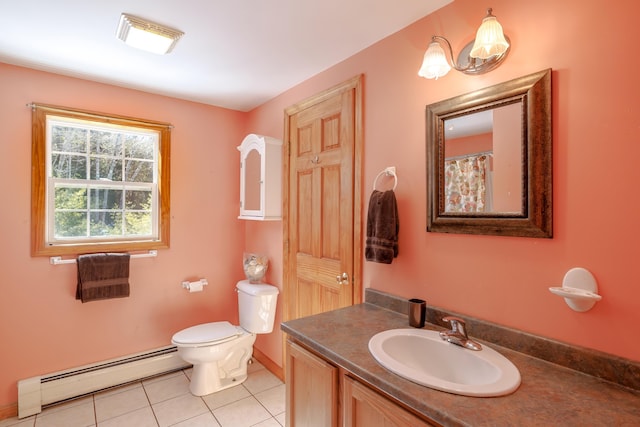 full bathroom with a baseboard heating unit, vanity, toilet, and tile patterned floors