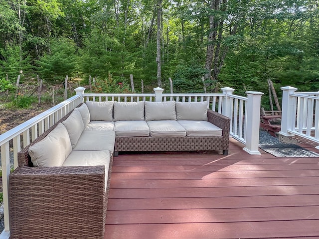 wooden deck with an outdoor hangout area