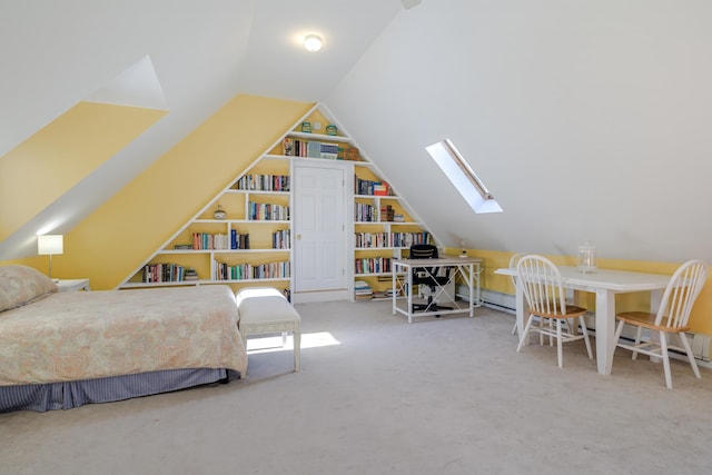 carpeted bedroom with vaulted ceiling with skylight