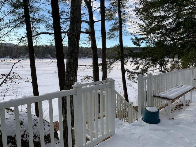 view of snow covered deck