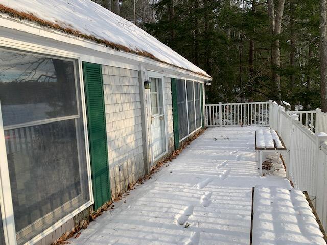 view of snow covered deck