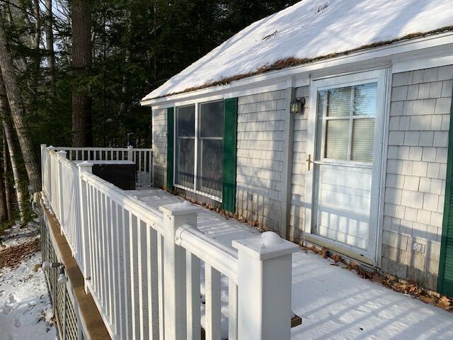 view of snow covered deck