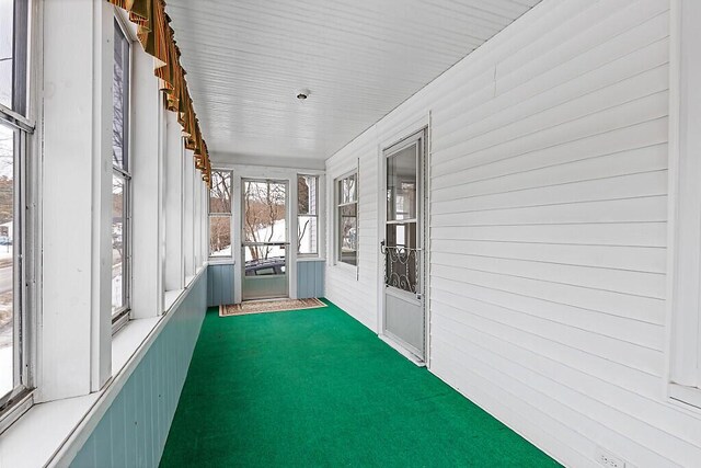 view of unfurnished sunroom