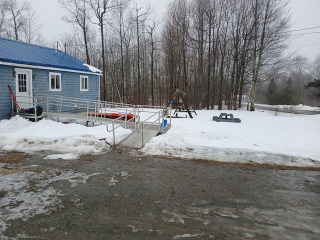 view of yard covered in snow