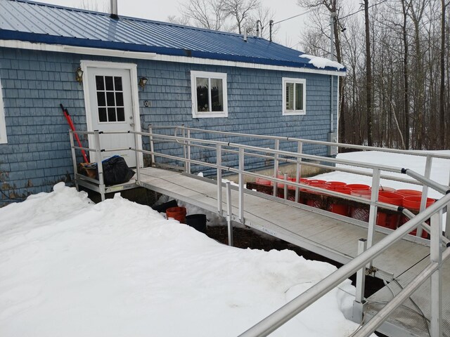 view of snow covered deck