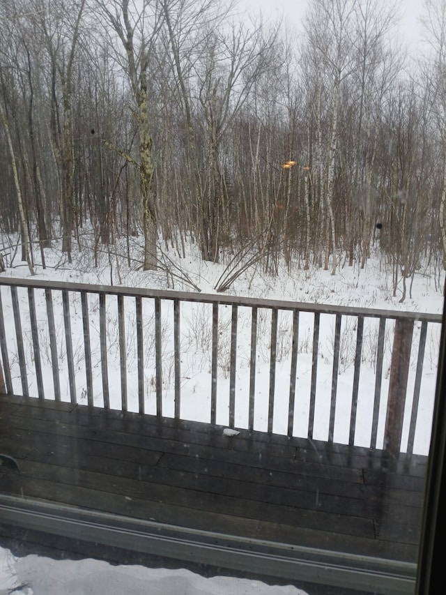 view of snow covered deck